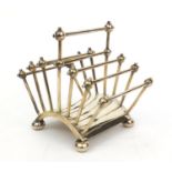 Hukin & Heath Christopher dresser silver plated six slice toast rack, with impressed lozenge mark