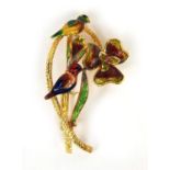 18ct gold enamelled brooch in a from of two birds seated in a flower set with a central ruby, marked