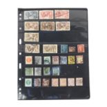 Sheet of Victorian and later stamps mounted on a card including seahorses and a penny red : For