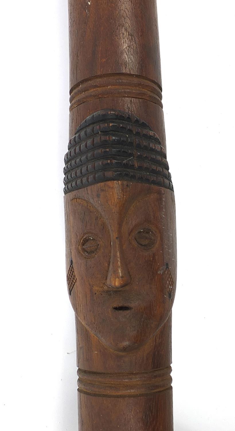 African hardwood ceremonial spear carved in relief with face masks, 208cm long : For Further - Image 4 of 5