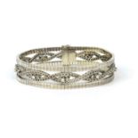 18ct white gold diamond bracelet with centre rope twist design, set with thirty diamonds,