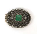 Late 19th/early 20th century Russian diamond brooch set with a central emerald, clasp fitting to the