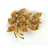 9ct gold diamond bouquet brooch set with thirteen diamonds, 4cm long, approximate weight 6.0g :