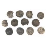 Collection of twelve antique hammered silver Penny's including an Edward I example, each