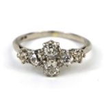 Platinum diamond ring set with six graduated diamonds, size L, approximate weight 4.0g : For Further