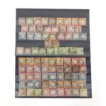 Collection of 19th century German stamps including twenty six small shields and fifty four large