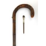 Brigg of London bamboo walking stick with silver mounted concealed pencil, engraved AK 1894,