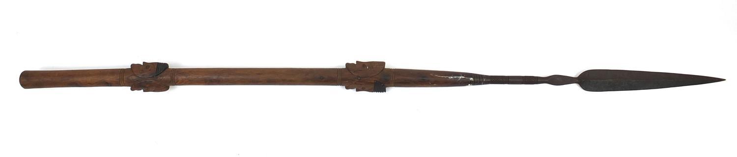 African hardwood ceremonial spear carved in relief with face masks, 208cm long : For Further - Image 5 of 5