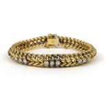 14ct gold rope design diamond bracelet set with twenty four diamonds, C & F makers mark,