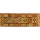 Rectangular Persian Kilim carpet runner, with an all over geometric design, 302cm x 84cm : For