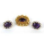 Victorian gold coloured metal amethyst mourning brooch and a pair of amethyst and seed pearl