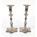 Pair of silver column candle sticks, with scallop shell base, O.S.S London 1978, 24.5cm high : For