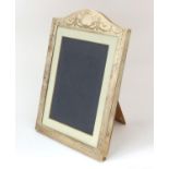 Large silver easel photo frame with engraved swag decoration, indistinct makers make for London