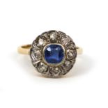 18ct gold sapphire and diamond ring set with a sapphire surrounded by eight diamonds, size M,