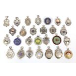 Collection of twenty seven silver motorcycling jewels, some 1930's examples, mostly awarded to E