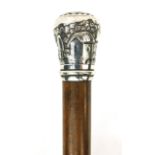 Wooden walking stick with silver pommel, embossed with Oriental figures in village, 94cm long :