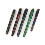 Group of five vintage marbleised fountain pens, comprising three Conway Stewarts, models No.475, 85L