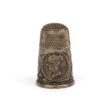 Victorian silver coloured commemorative thimble decorated with portraits of Queen Victoria and