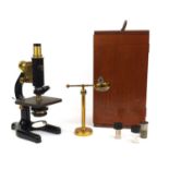 Charles Perry of London adjustable brass microscope together with a broadhurst Clarkson & Co brass