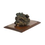 Vienna cold painted bronze Yorkshire Terrier letter clip, wearing a bow, on a mahogany wall