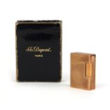 Boxed Dupont gold plated lighter with engine turned decoration, factory marks to the base, 4.7cm