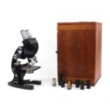 US Bausch & Lomb adjustable microscope with lenses, housed in a fitted box, impressed CL2550, the