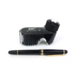 Mont Blanc Meisterstuck fountain pen, with 14k gold nib together with a bottle of Mont Blanc ink,