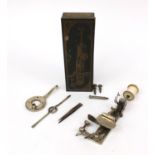 The Moldacot sewing machine with accessories, tin and part box, the sewing machine numbered 11823,