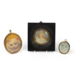 Three watercolour portrait miniatures, including one onto ivory of a semi nude female with flowing