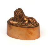 Victorian copper jelly mould in the form of a recumbent lion, stamped R.V.2 to the rim, 17cm high