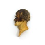 Carved ivory bust of Lord George Gordon Byron, inscribed to the reverse, 5cm in length