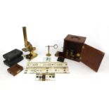 Stanley of London adjustable brass microscope with fitted mahogany carrying box, together with