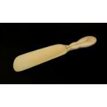 Erotic carved ivory shoe horn, 20.5cm in length