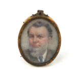 Oval watercolour portrait miniature onto ivory of a gentleman, bearing an indistinct monogram to the