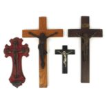 Four religious interest crucifix, including a gilt bronze example mounted on a rosewood crucifix,