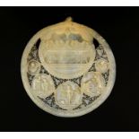 Mother of Pearl shell carved with The Last Supper, profusely pierced with flowers and foliage, 16.