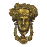 Victorian brass door knocker in the form of a Maidens head, 17cm in length