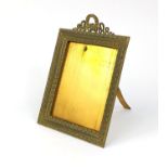 Rectangular gilt brass easel photo frame with floral and wreath decoration, impressed AF to the