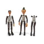 Three Swiss metal jointed character dolls by Bucherer, two with composition heads, one with two