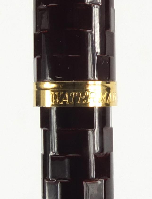 Three fountain pens comprising a black Parker, black Conway Stewart 388 and a red faceted Waterman's - Image 2 of 5