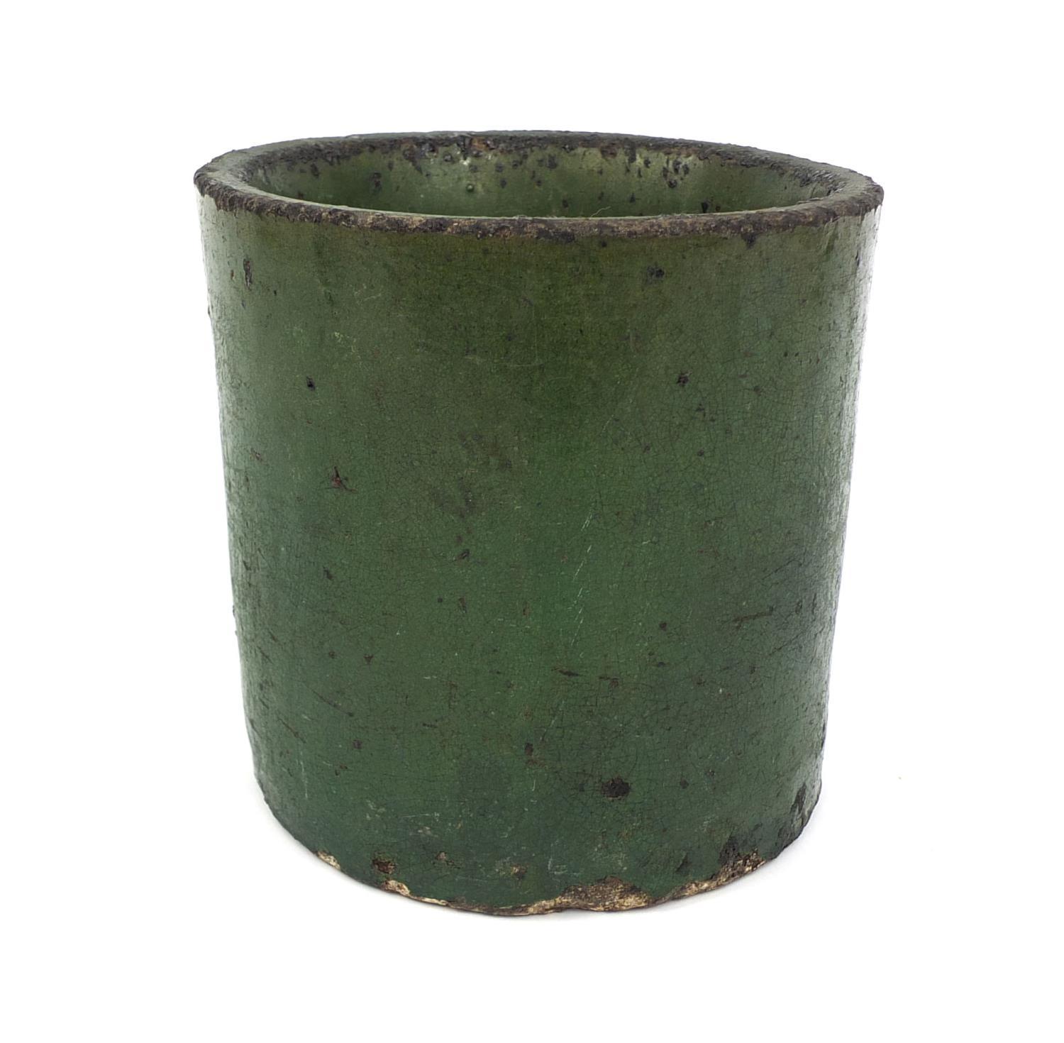 Chinese green glazed Scholars brush pot, the base decorated with a five claw dragon, 15.5cm high