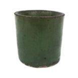 Chinese green glazed Scholars brush pot, the base decorated with a five claw dragon, 15.5cm high