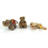 Three Steiff teddies comprising a bear with articulated limbs and original paper label, an