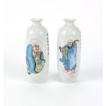 Pair of Chinese porcelain vases hand painted with figures, peaches and script, both with six