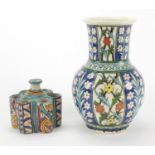 Iznik pottery vase and sectional vessel both hand painted with stylised flowers, the vase 21cm high