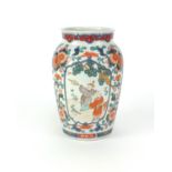 Japanese Imari porcelain vase hand painted with figures and flowers, 26cm high Overall in