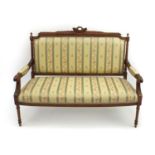 Victorian carved walnut two-seater settee with striped upholstery 102cm high x 131cm wide x 53cm