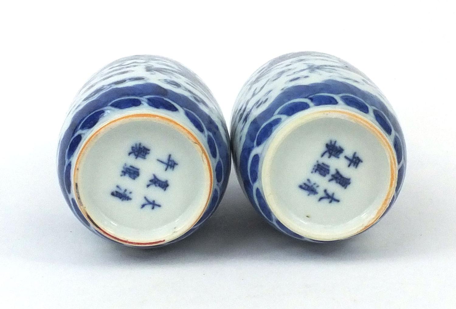 Pair of Chinese blue and white porcelain vases, both hand painted with phoenixes and dragons chasing - Image 6 of 8