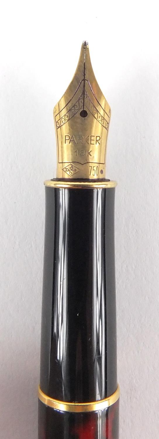 Parker red marbleised Sonnet fountain pen with 18k gold nib, together with two other Parker pens - Image 2 of 4