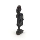 Tribal interest wooden carving of a tribesman, 22cm high